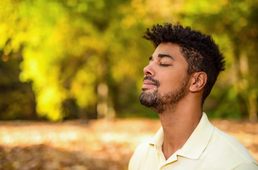young black man using treatments to recover from depression symptoms (1)