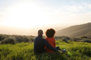 couple together in field coping with anxiety and depression