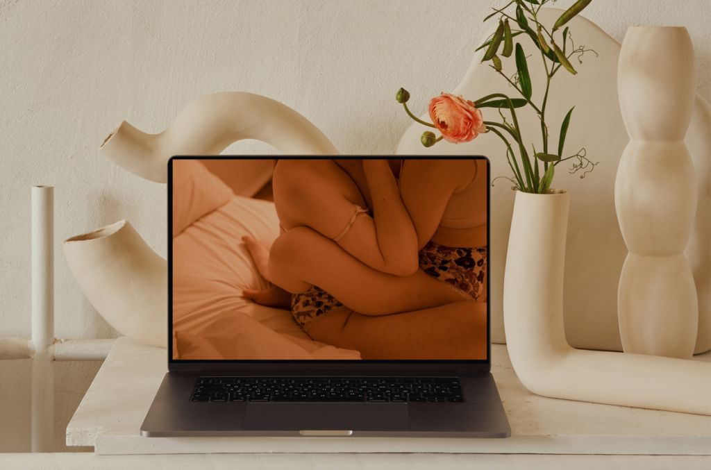 open laptop user wondering if watching porn is bad
