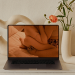 open laptop user wondering if watching porn is bad