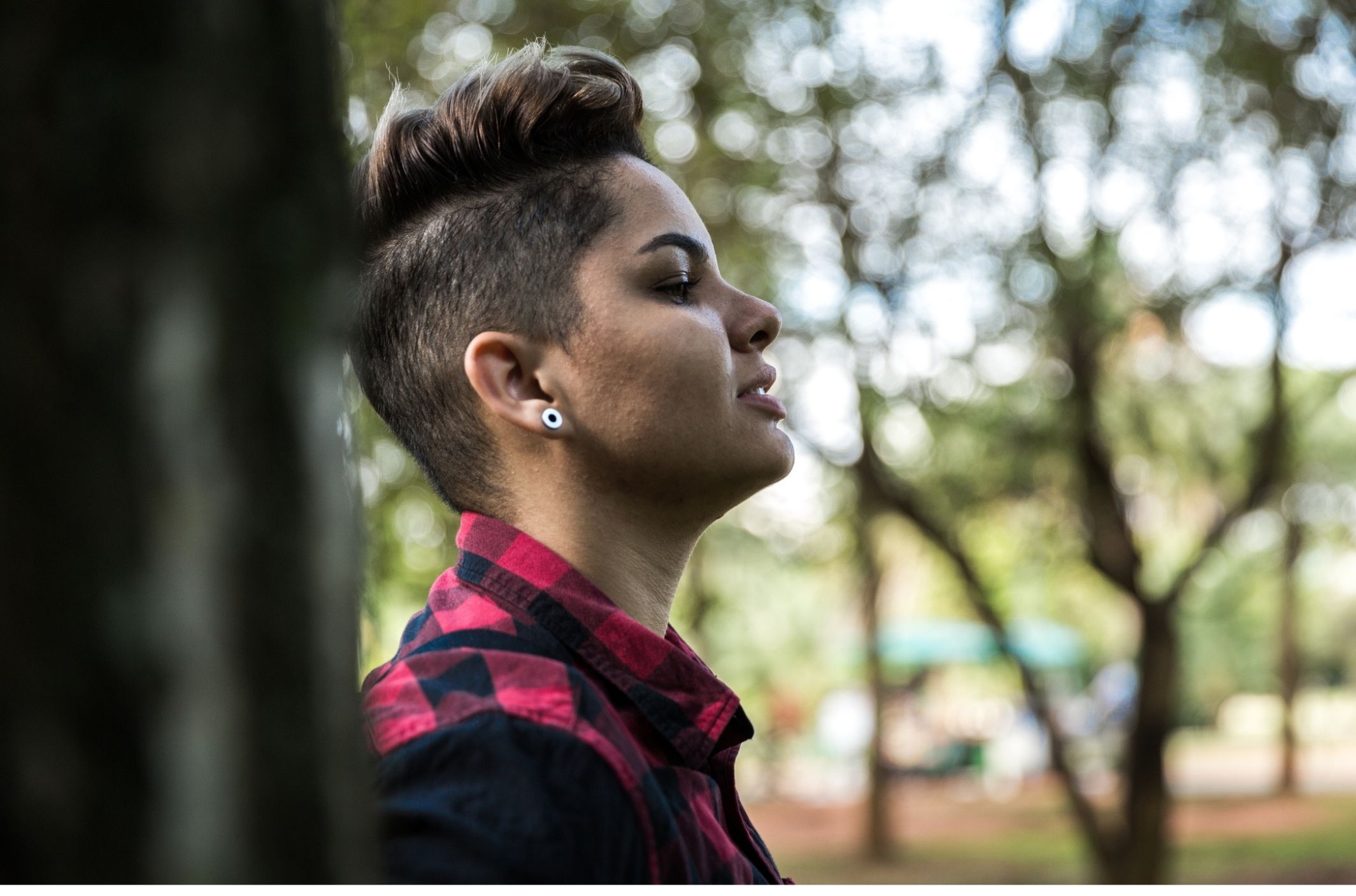 young woman with short hair learning how to calm anxiety in stressful situation