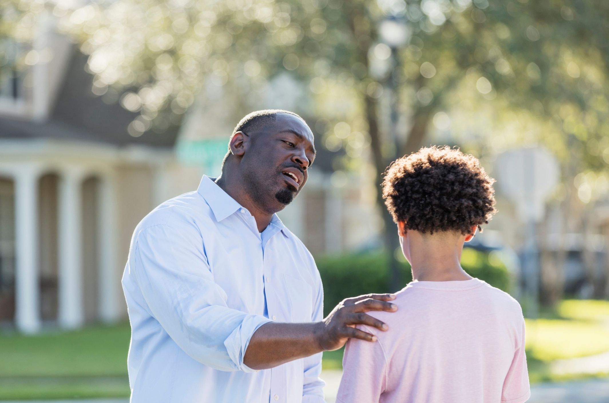black father talking to son about racism and minority stress mental health impact
