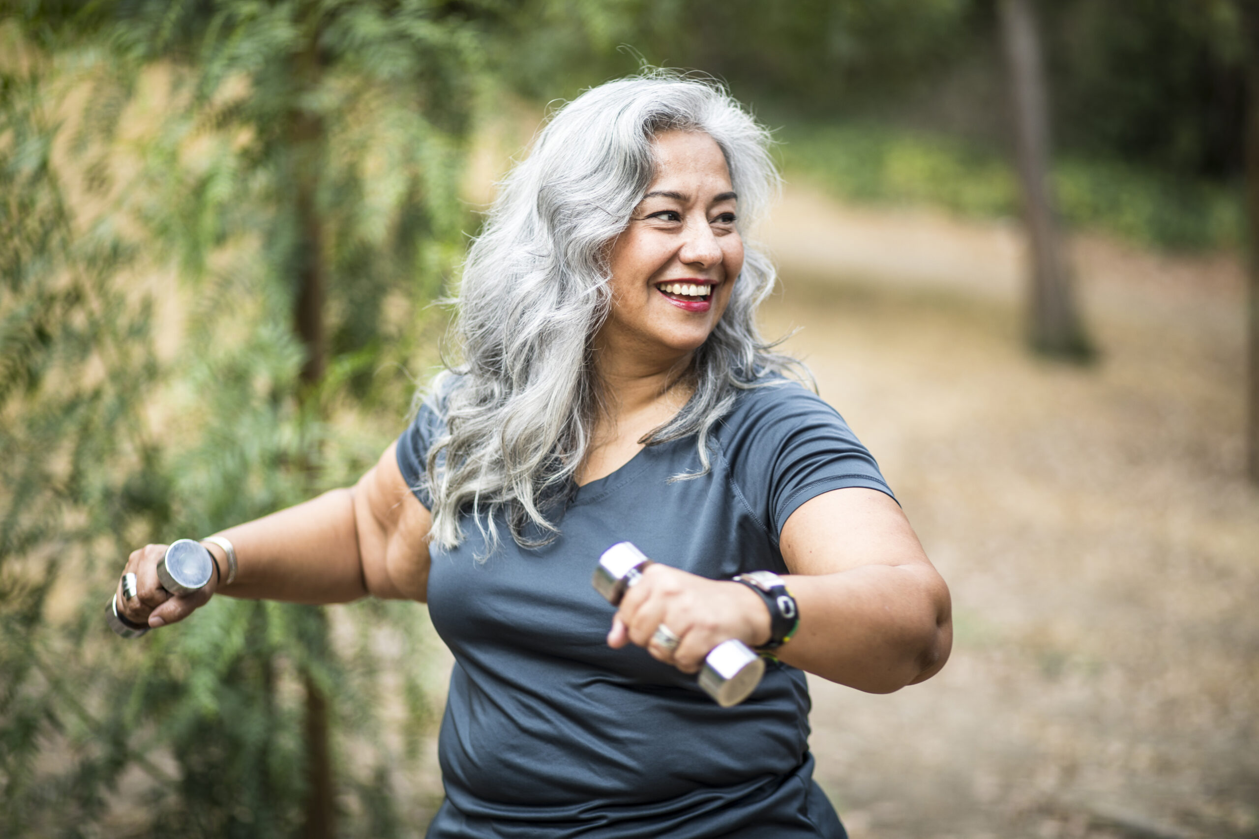 Woman engaging in a workout routine, demonstrating physical activity and vitality, which ties into the broader health benefits of GLP-1 medications beyond just weight loss